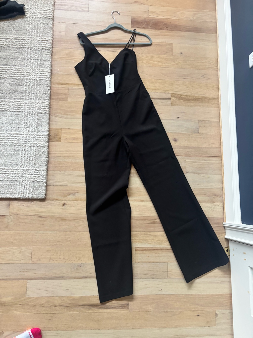 Likely Black Asymmetric-Strap Jumpsuit